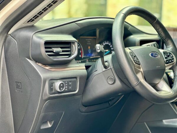 Nội thất Ford Explorer 2024 - Phím xoay điều chỉnh đèn pha cos